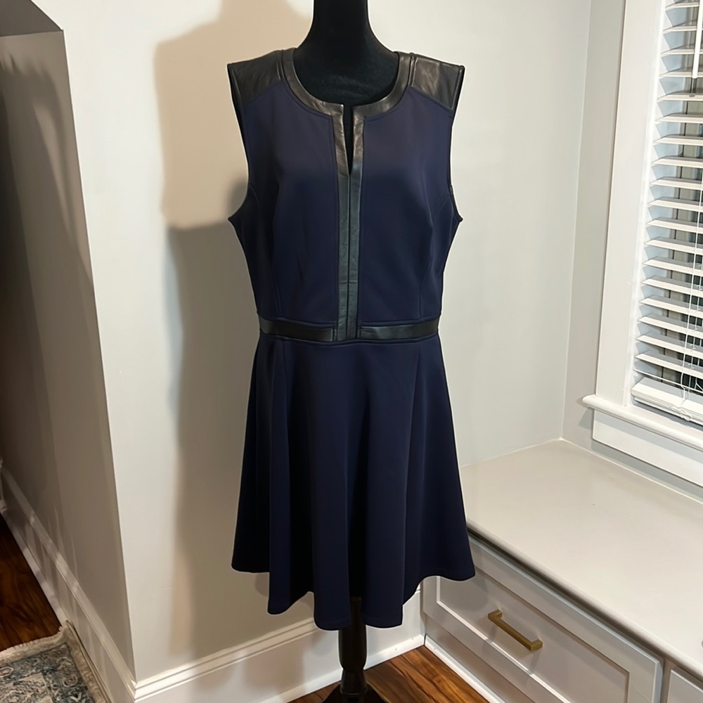 Navy sleeveless dress with black faux leather trim